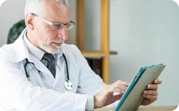 doctor working on tablet